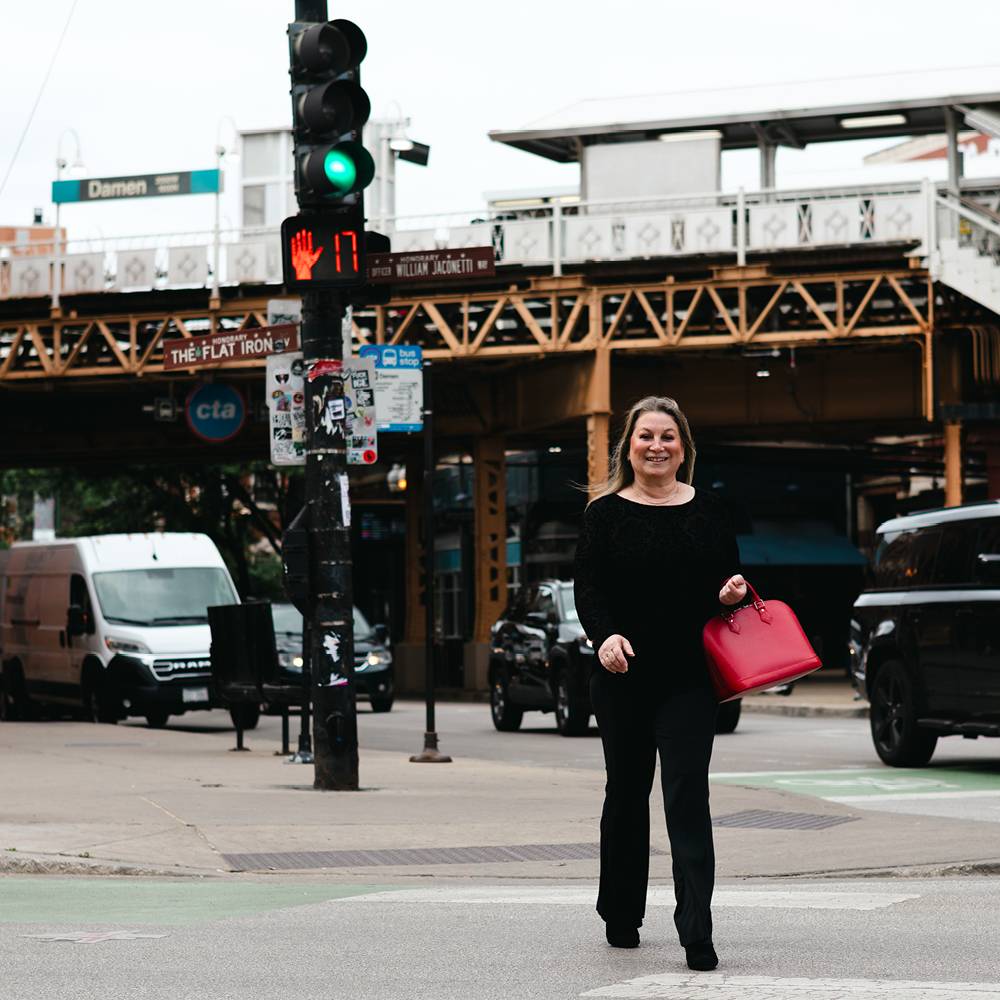 Julie A. Katz crossing a Chicago street