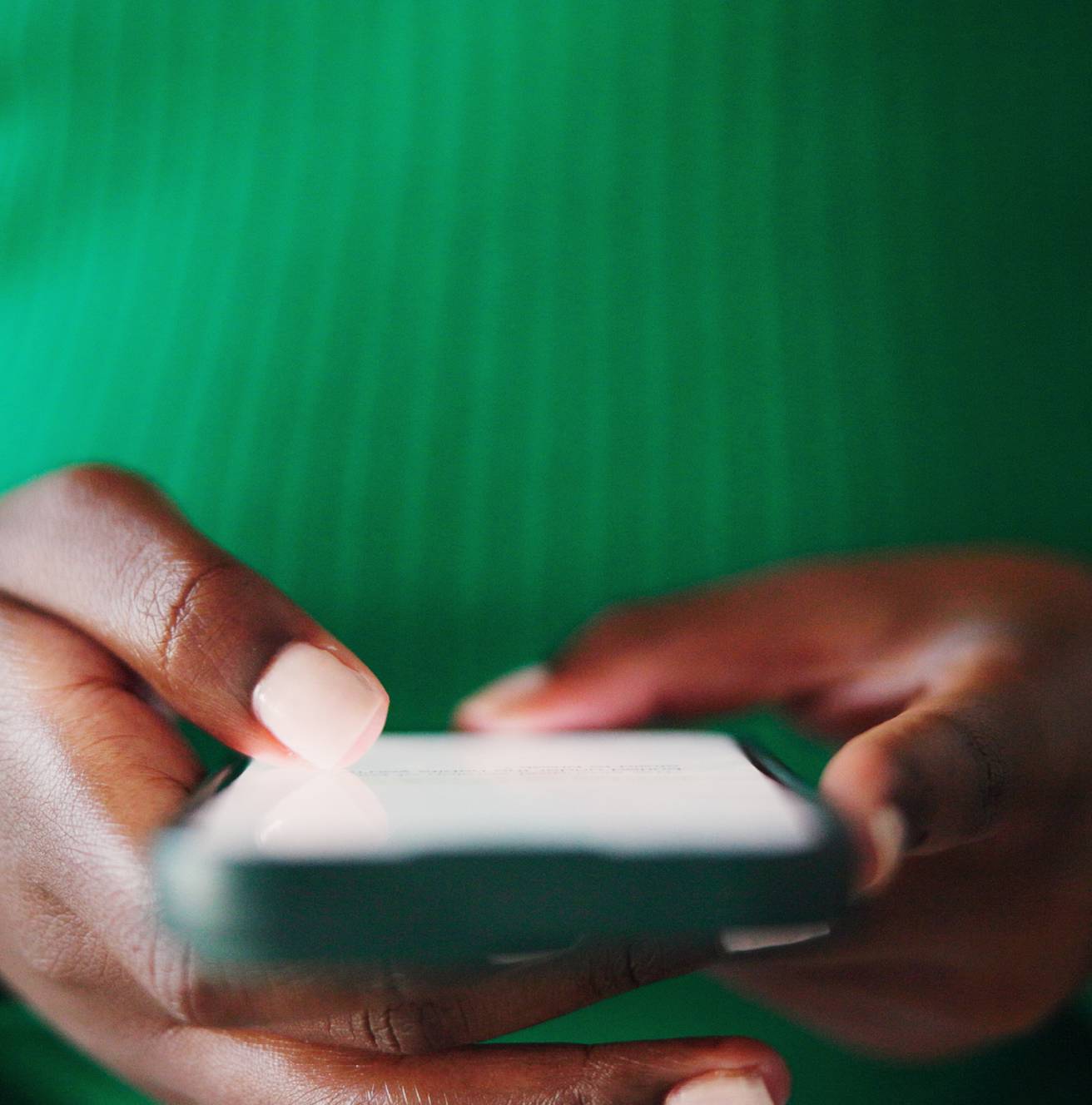 Hands holding a smartphone