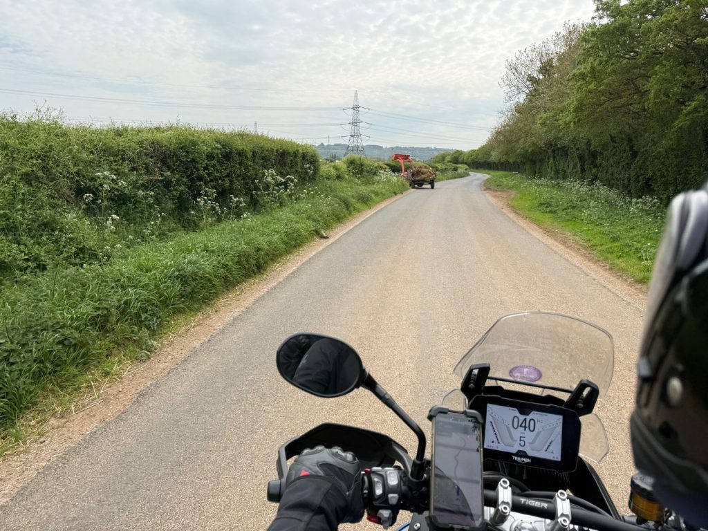 Country road in England seen from a motorcycle